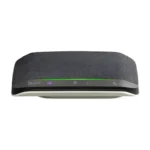 Poly Sync 10 Teams speakerphone with dark textured mesh face, glowing purple Teams button, and green LED light bar.