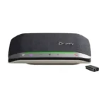 Poly Sync 20 Plus Teams certified speakerphone with charcoal grille, glowing purple Teams button, and USB-C adapter.
